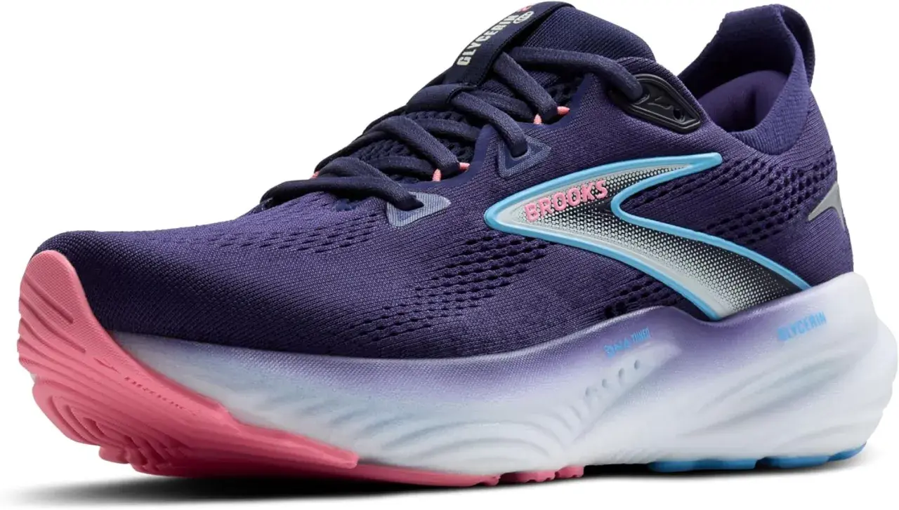 Dunkelblauer Damenschuh mit pinker Sohle und hellblauen Akzenten. Die Brooks Glycerin 22 Damen sind bereit für deinen nächsten Lauf.